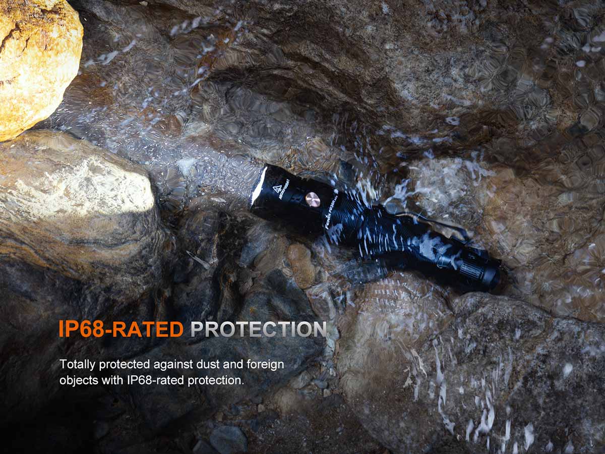 fenix pd36r ace waterproof flashlight in a creek with 'IP68-RATED PROTECTION' text